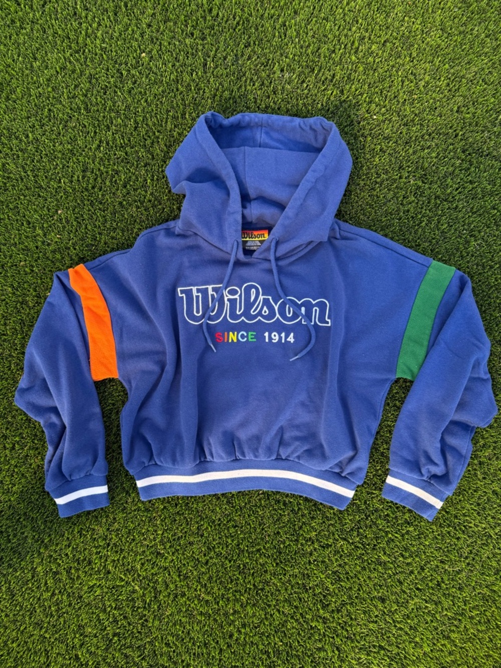 Wilson - Women’s Royal Blue Hoodie with Red, Orange & Yellow Tag